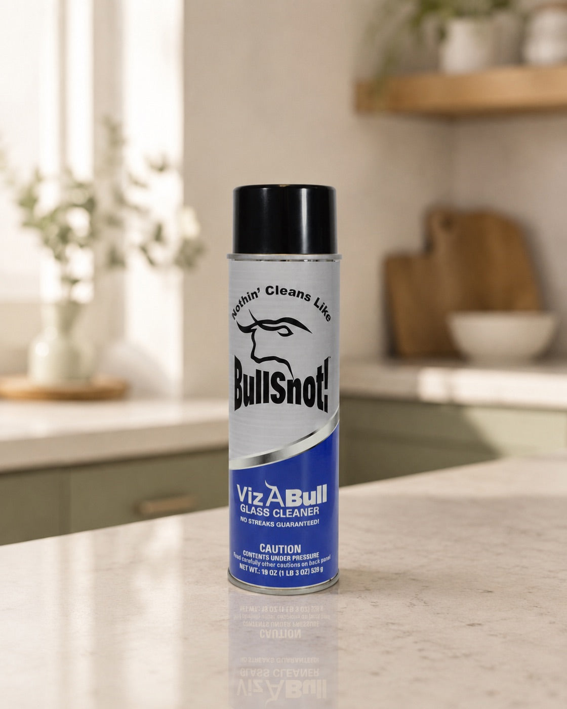 VizABull can standing on a white quartz counter in a bright, calm kitchen.
