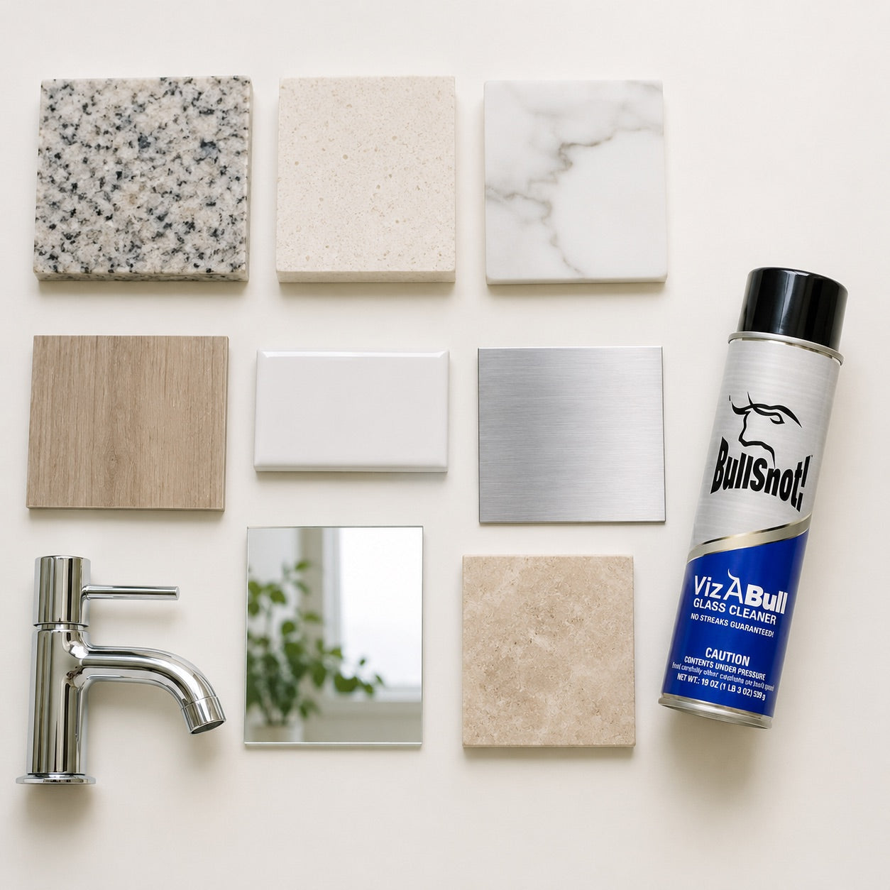 Granite, quartz, marble, laminate, ceramic tile, stainless steel, a chrome tap, a mirror and travertine laid out beside the VizABull can.